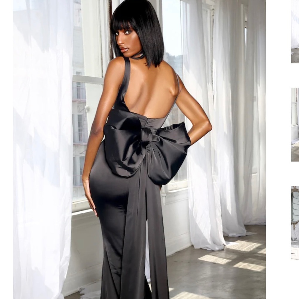 “Moda Glam Boutique” Beautiful and elegant floor length black ball gown